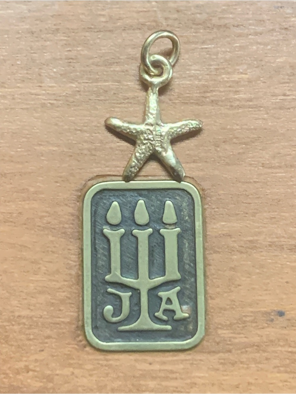 Retired James Avery 14k starfish charm